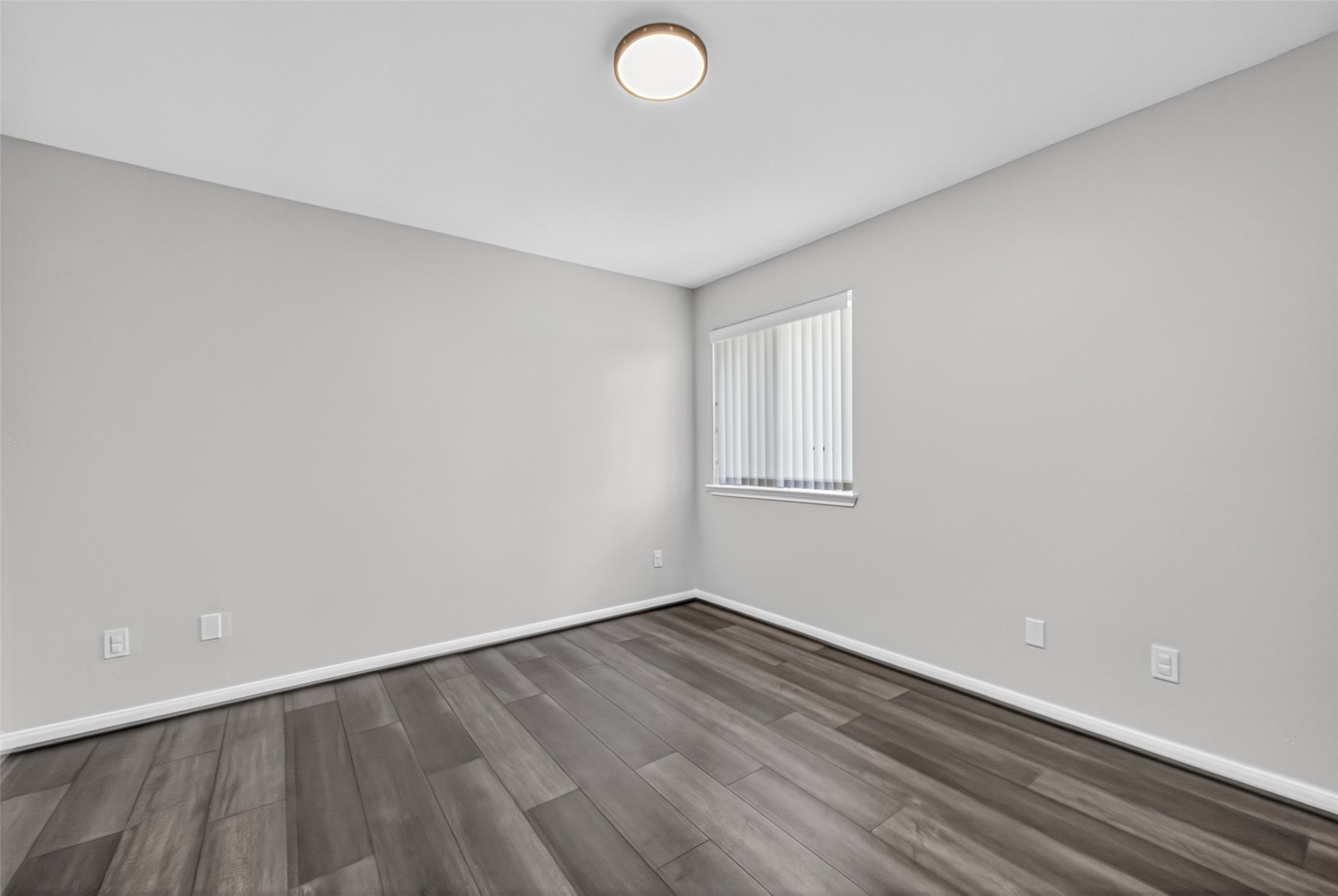 1003 Alp Springs Lane Spring, TX 77373 - Photo 35 of 43 a view of a room with wooden floor and fan