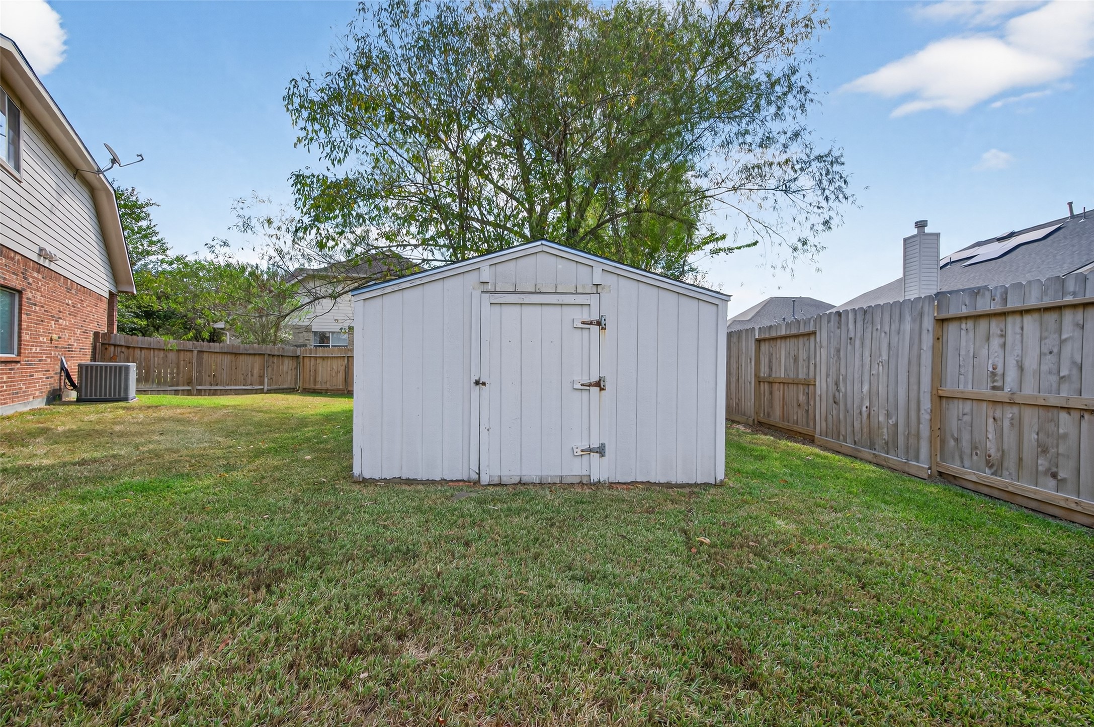 1003 Alp Springs Lane Spring, TX 77373 - Photo 41 of 43 a view of a small house with a yard