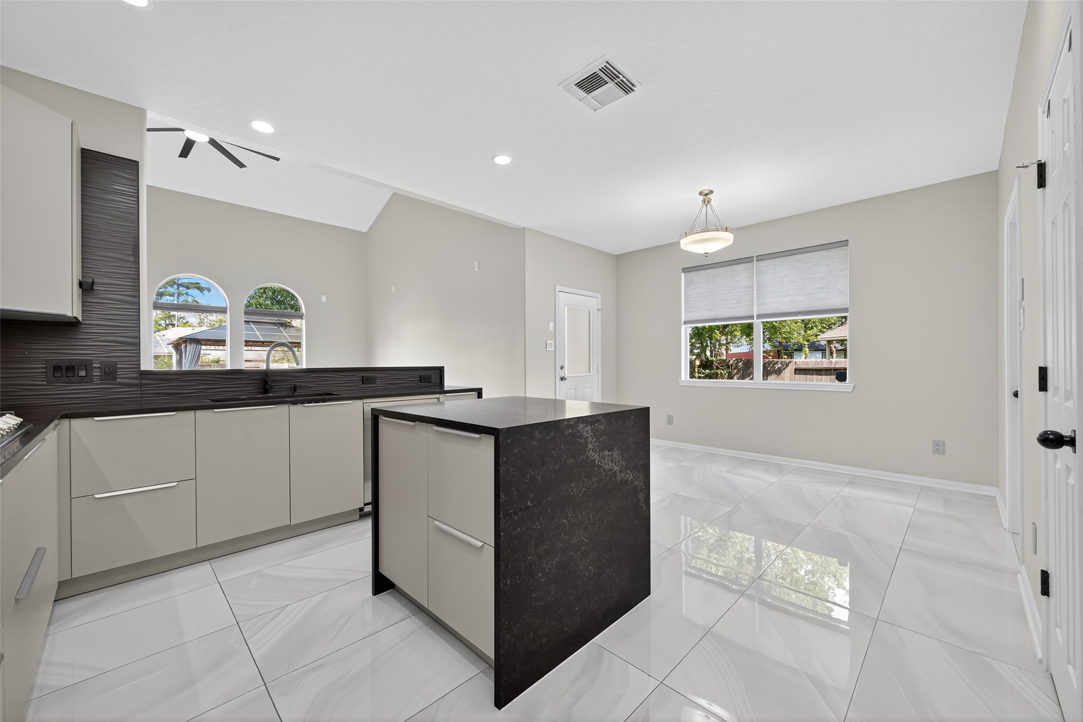 1003 Alp Springs Lane Spring, TX 77373 - Photo 9 of 43 a kitchen with cabinets and window