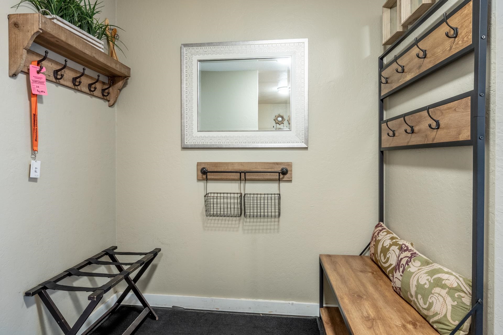 2289 Sierra Nevada Road, Unit F4 Mammoth Lakes, CA 93546 - Photo 16 of 22 a view of a room with rack and wooden floor