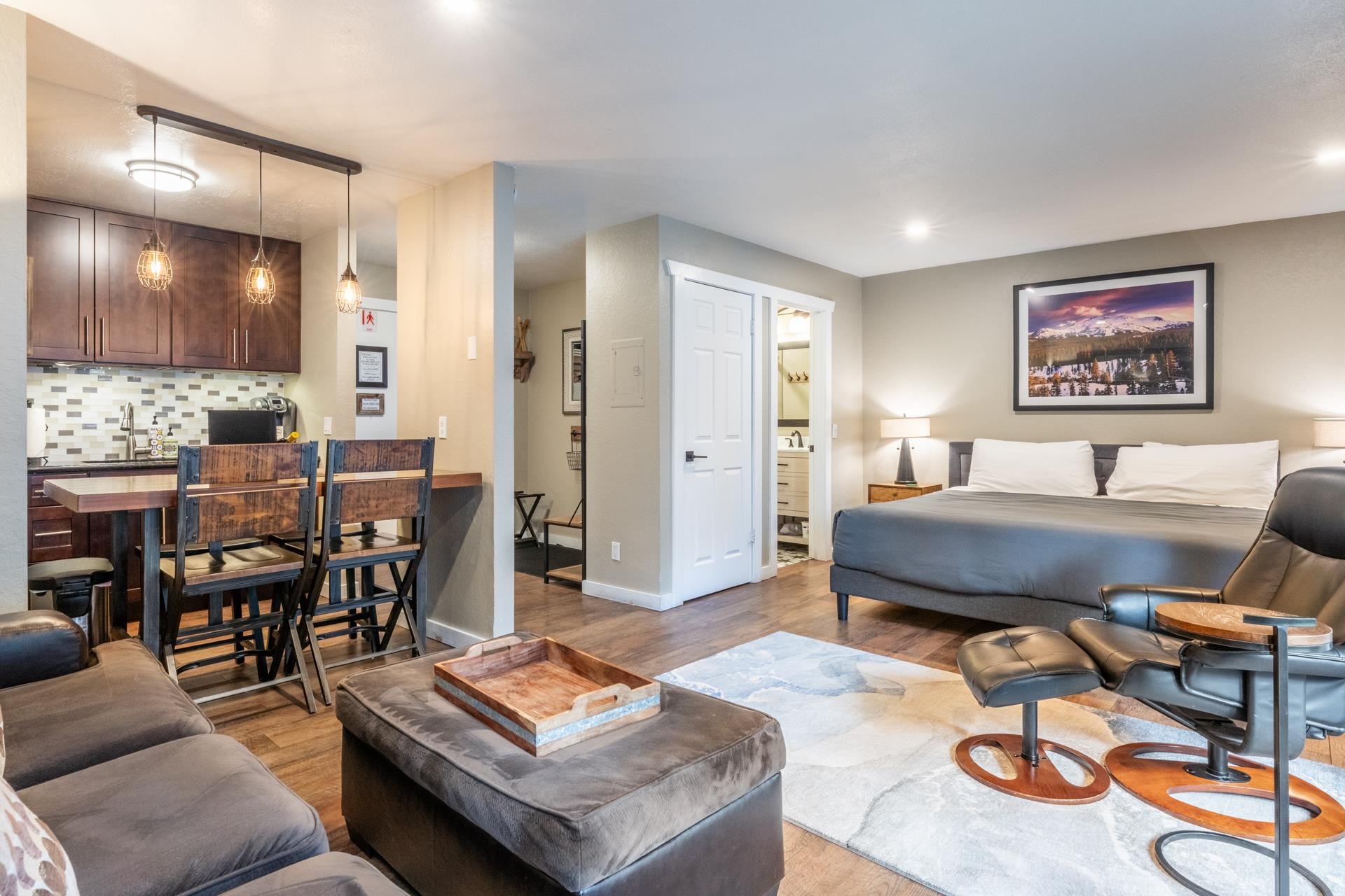 2289 Sierra Nevada Road, Unit F4 Mammoth Lakes, CA 93546 - Photo 8 of 22 a living room with furniture and kitchen view