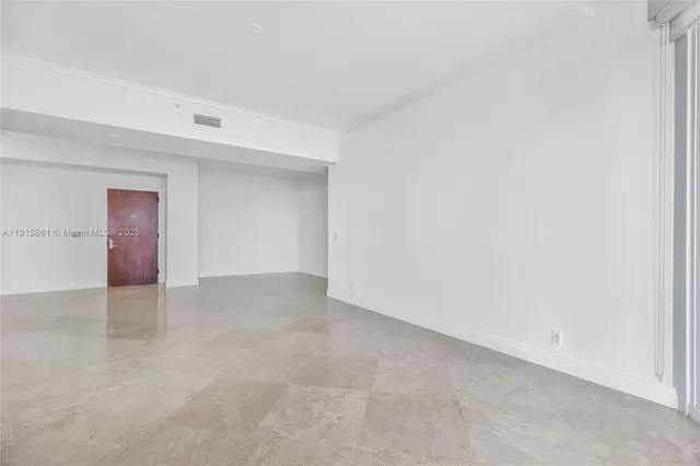 a spacious bathroom with a granite countertop sink mirror and bathtub