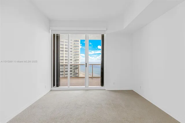 a view of a room with floor to ceiling window