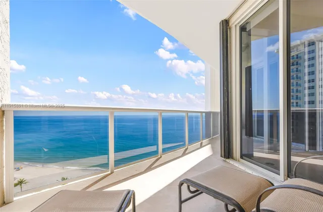 a view of a balcony with an outdoor space
