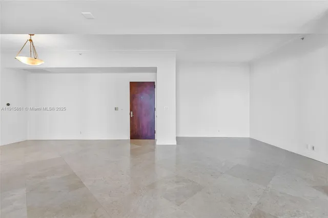 an empty room with a natural light