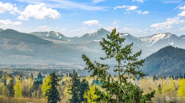 a view of a houses with a lake