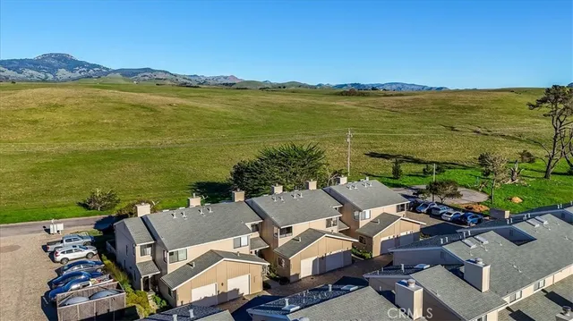 a view of a city with an ocean view