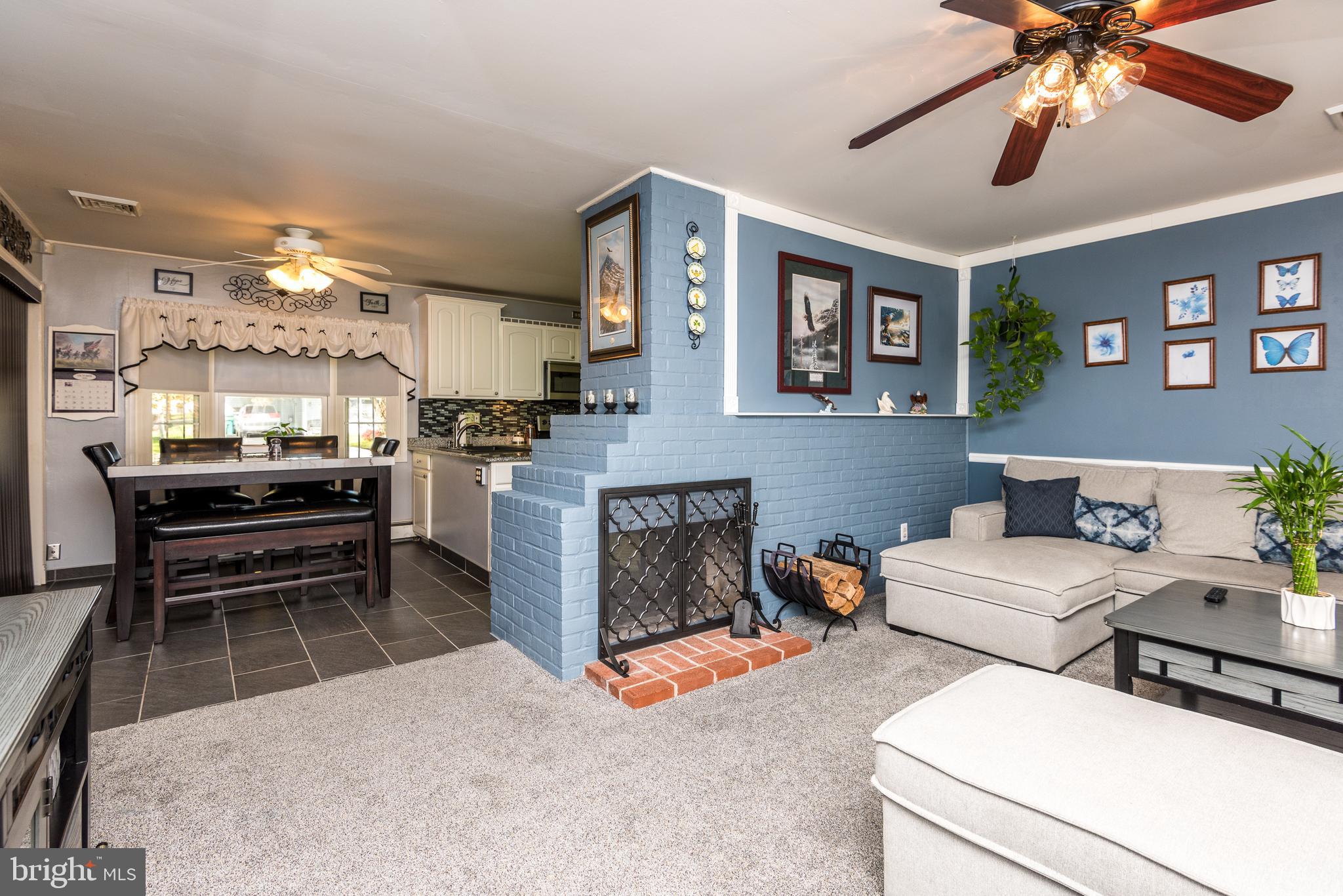 116 Border Rock Road Levittown, PA 19057 - Photo 6 of 27 Two-sided fireplace!