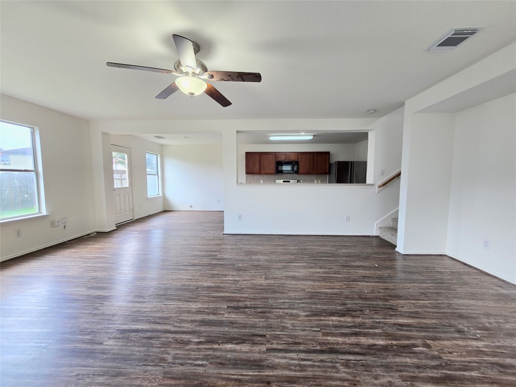 22911 Twisting Maple Court Spring, TX 77373 - Photo 13 of 37 a view of empty room with wooden floor