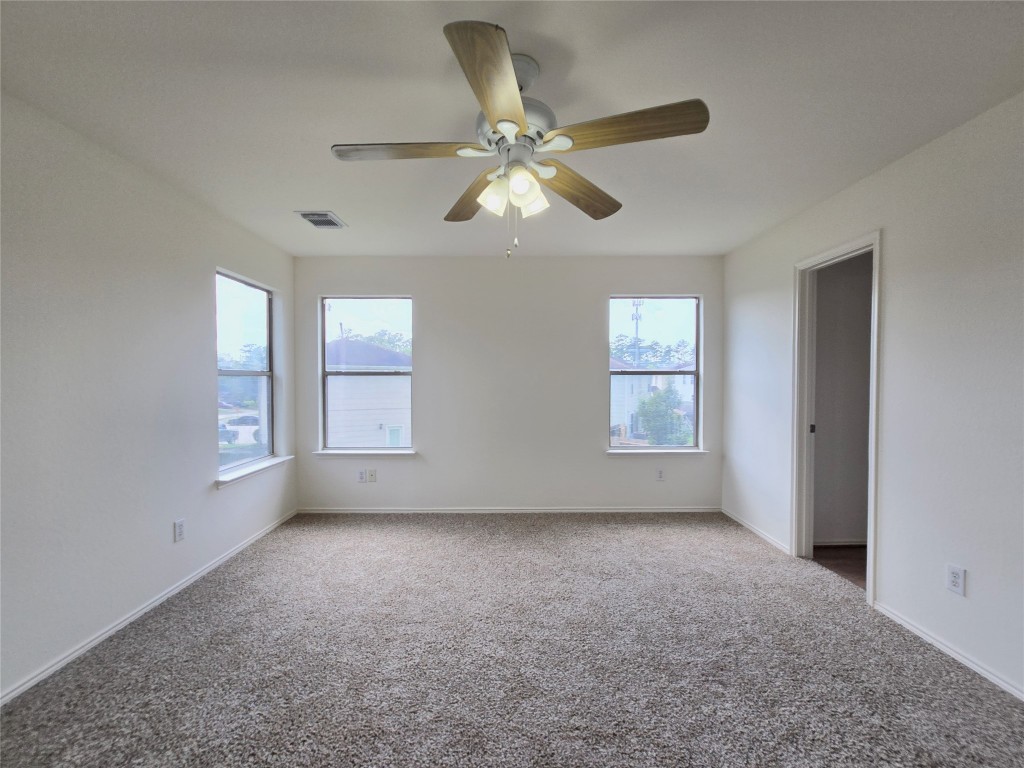 22911 Twisting Maple Court Spring, TX 77373 - Photo 24 of 37 a view of room with window and ceiling fan