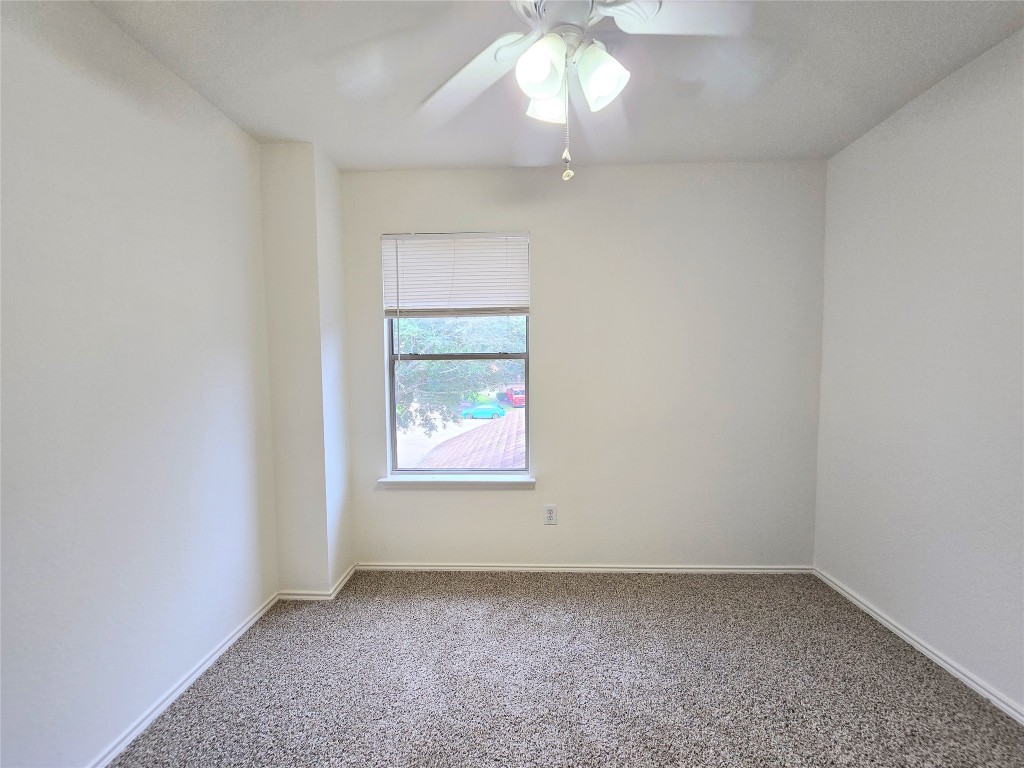 22911 Twisting Maple Court Spring, TX 77373 - Photo 32 of 37 an empty room with a window