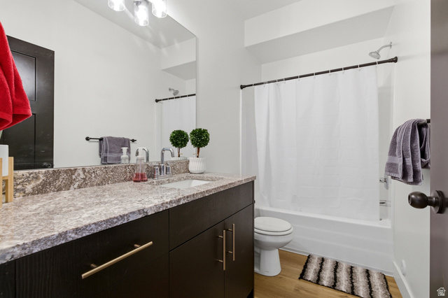 3902 West 825 North West Point, UT 84015 - Photo 43 of 49 Full bath with vanity, light wood-style flooring, and shower / bathtub combination with curtain