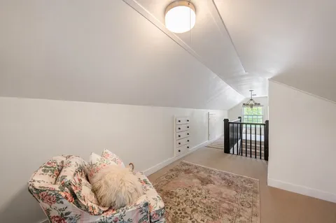 a view of a livingroom with wooden floor