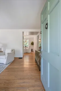 a view of livingroom with furniture and hardwood floor
