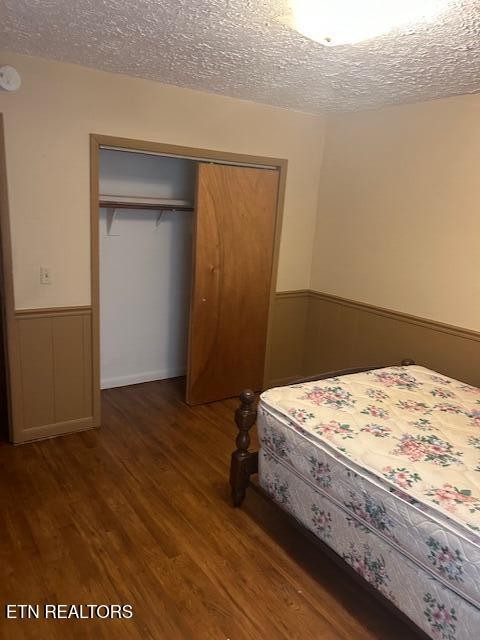 4551 Upper Crab Road Jamestown, TN 38556 - Photo 13 of 22 a bed sitting in a bedroom next to a window