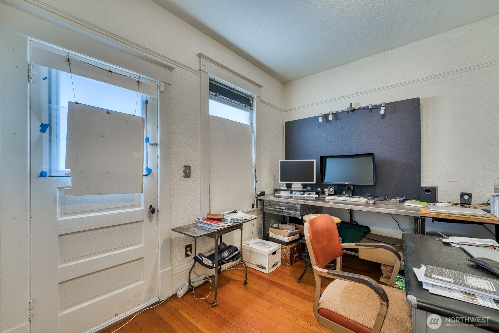618 South 15th Street Tacoma, WA 98405 - Photo 17 of 30 a view of a workspace with furniture and a window