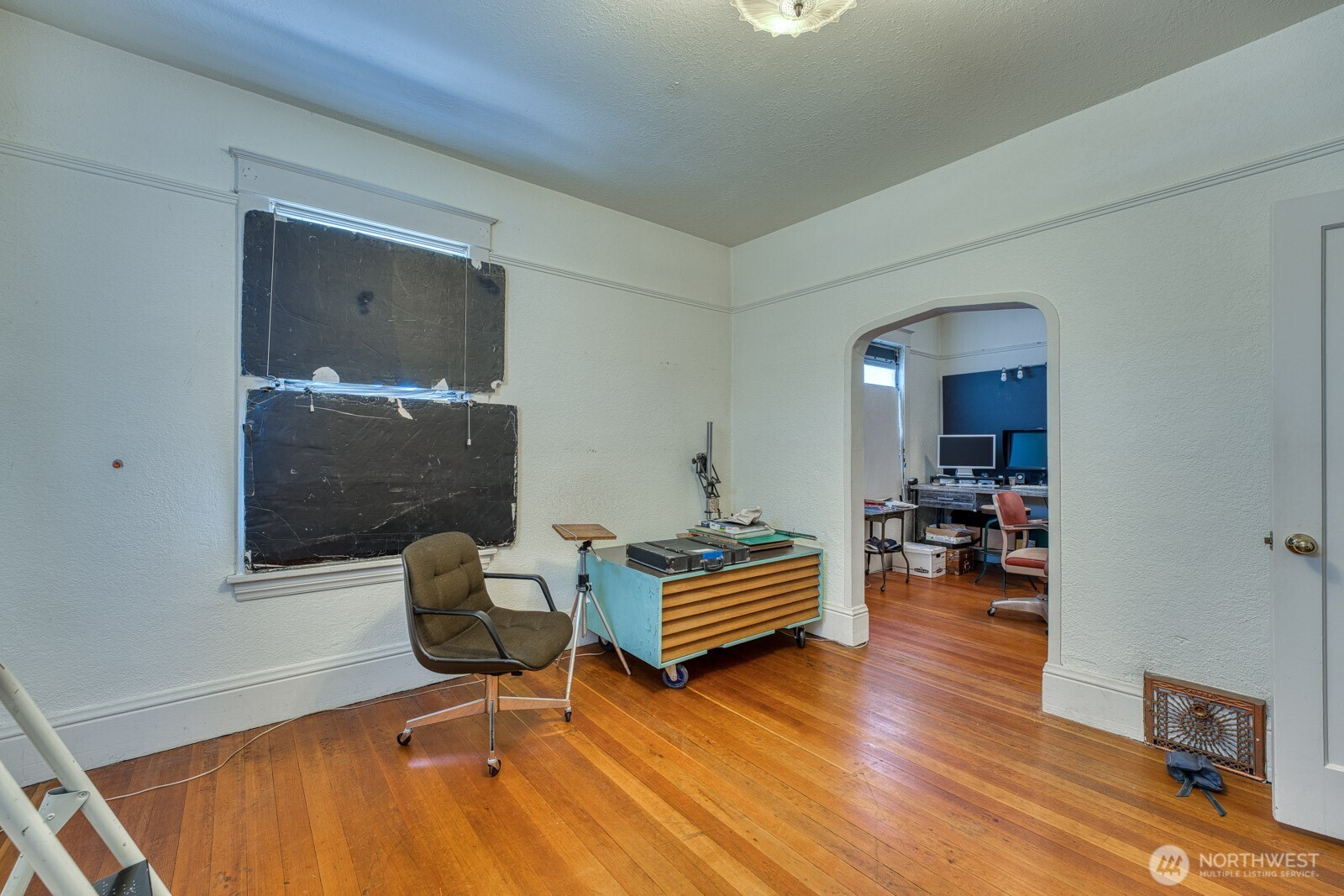618 South 15th Street Tacoma, WA 98405 - Photo 18 of 30 a living room with furniture and wooden floor