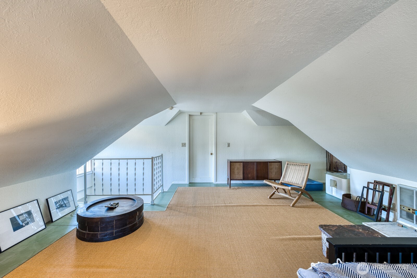 618 South 15th Street Tacoma, WA 98405 - Photo 26 of 30 a living room with furniture and a wooden floor