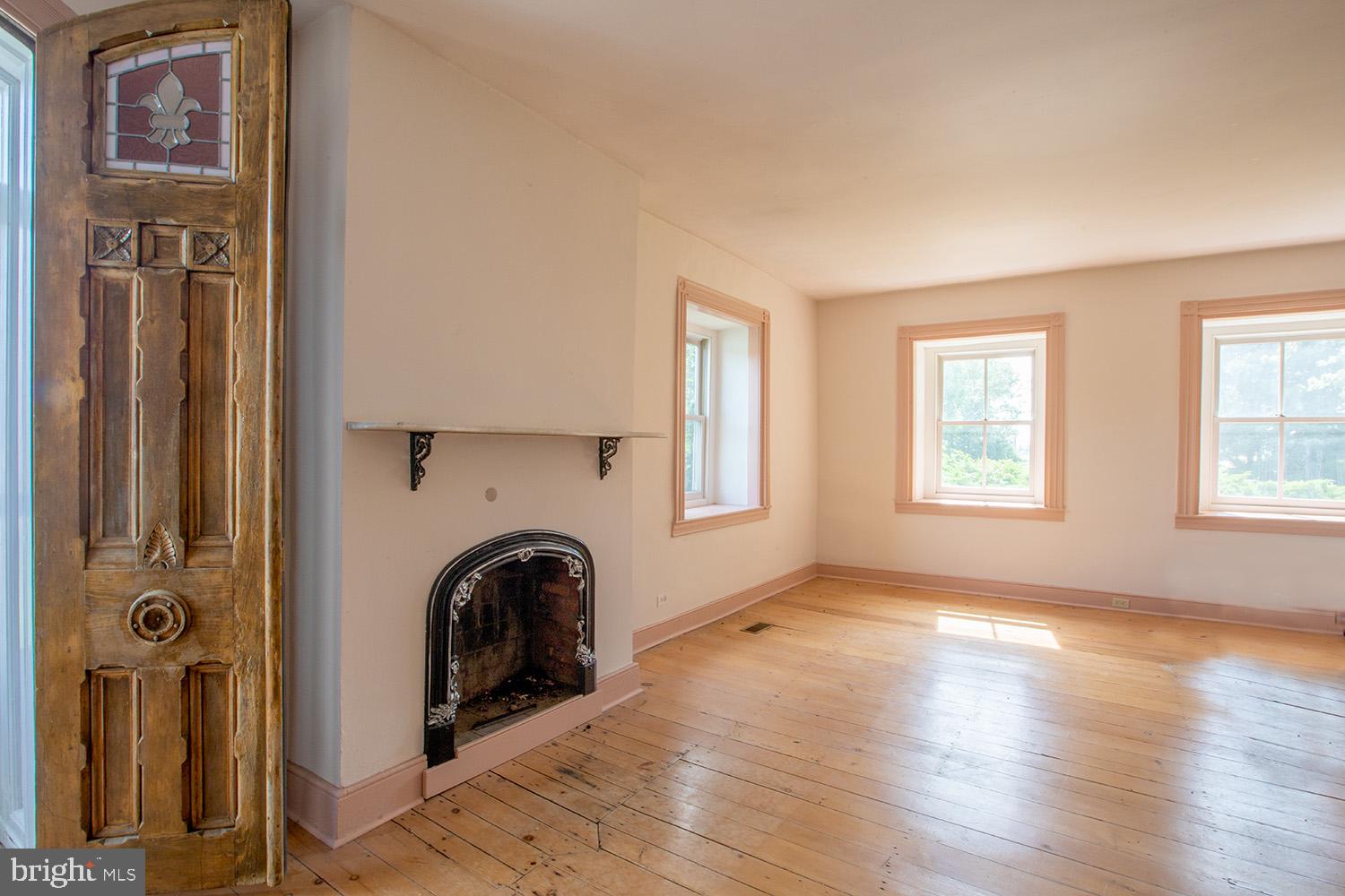 385 Albright Road Kutztown, PA 19530 - Photo 15 of 36 an empty room with windows dryer and washer