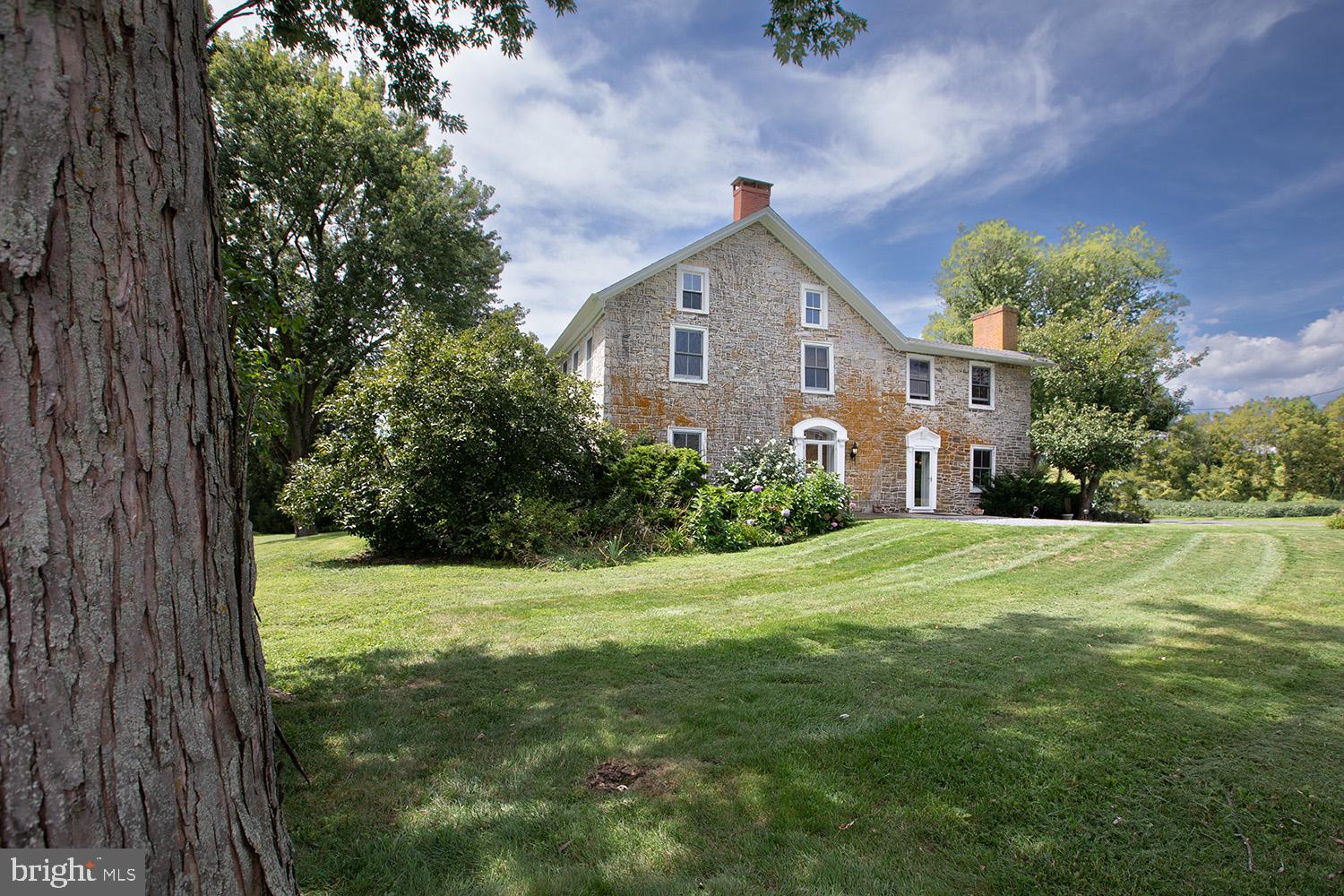 385 Albright Road Kutztown, PA 19530 - Photo 2 of 36 a front view of a house with a yard