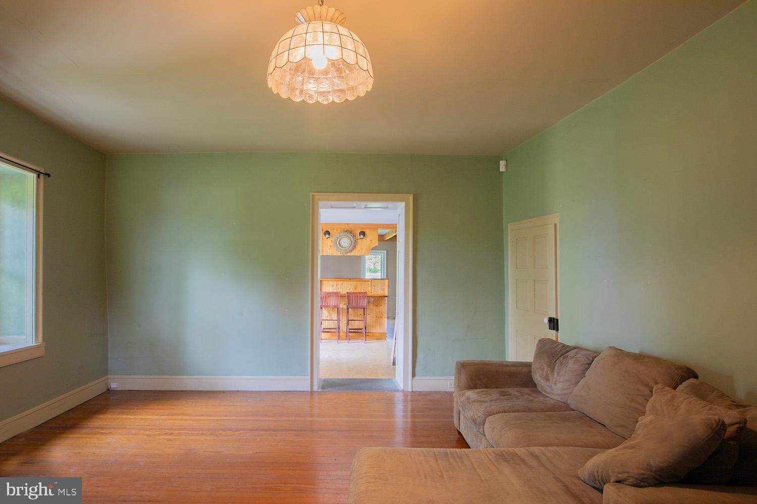 385 Albright Road Kutztown, PA 19530 - Photo 22 of 36 a living room with furniture and a window