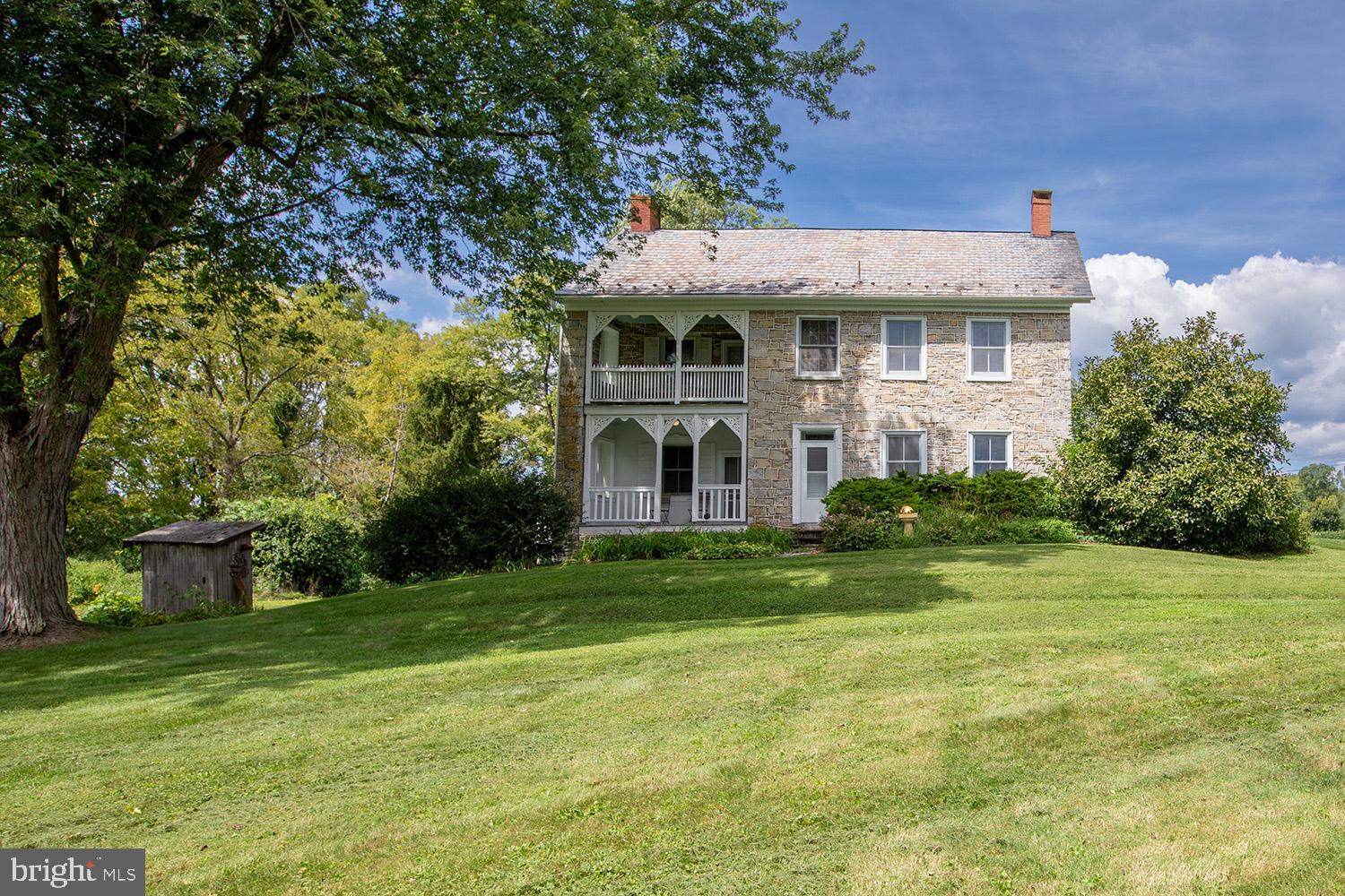 385 Albright Road Kutztown, PA 19530 - Photo 4 of 36 a front view of a house with a yard