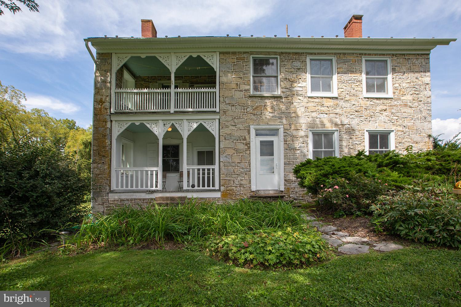 385 Albright Road Kutztown, PA 19530 - Photo 5 of 36 a front view of a house with a yard