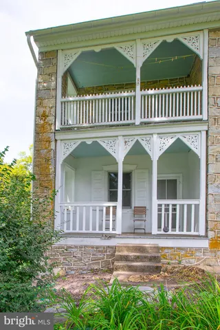 a view of a house with a porch