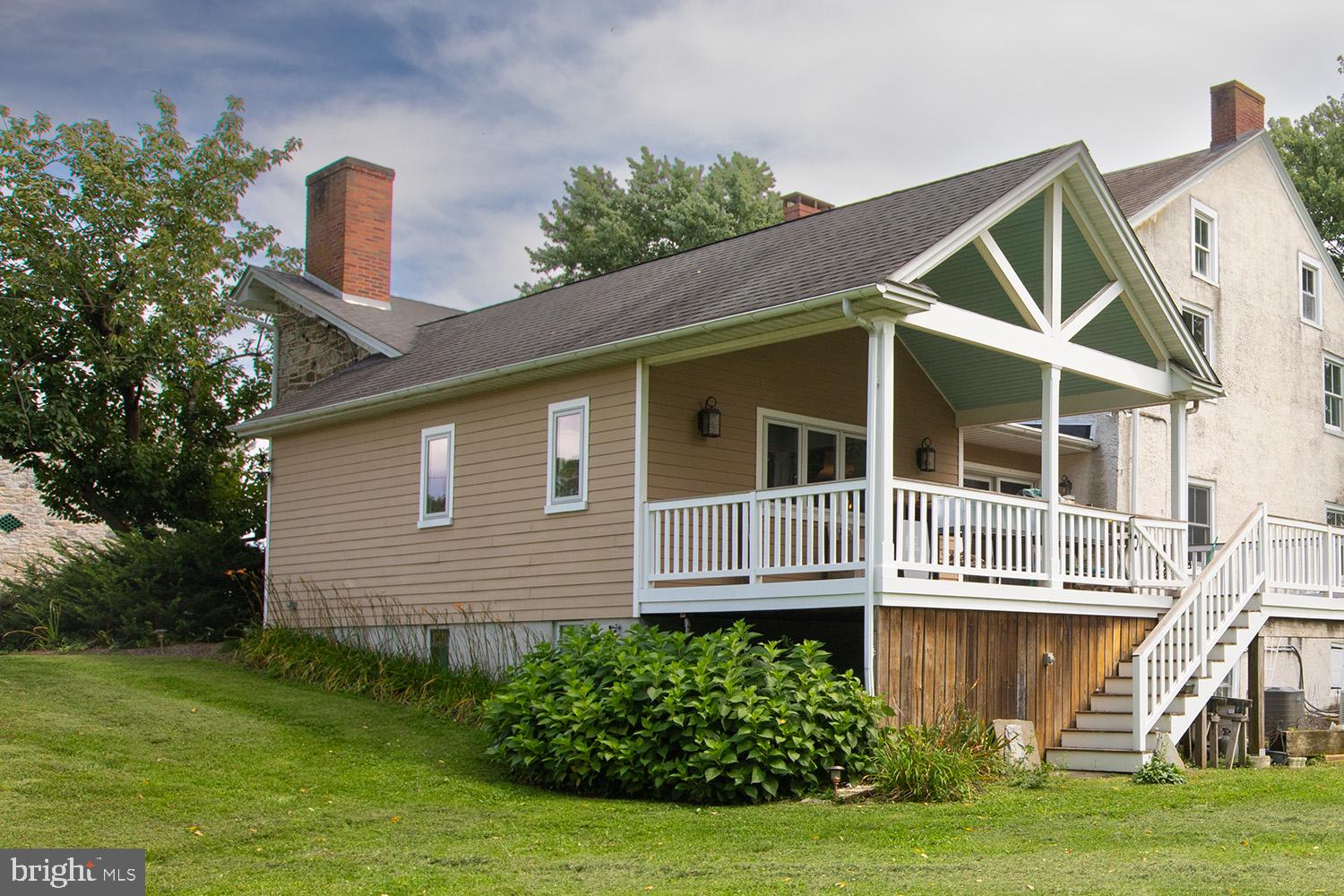 385 Albright Road Kutztown, PA 19530 - Photo 10 of 36 a front view of a house with garden