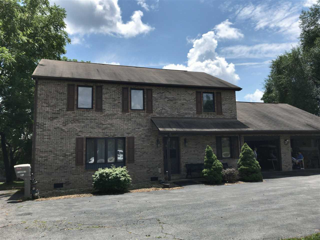 400 Cedar Green Road Staunton, VA 24401 - Photo 1 of 49 a front view of a house with a garden