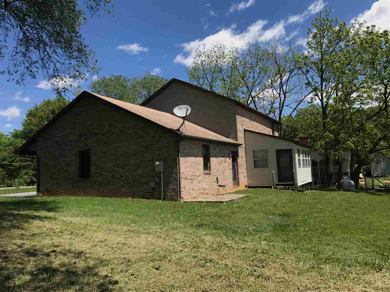400 Cedar Green Road Staunton, VA 24401 - Photo 18 of 49 a front view of a house with a yard and garage
