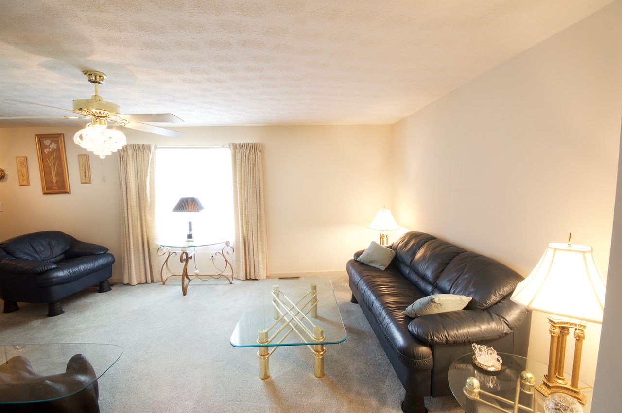 400 Cedar Green Road Staunton, VA 24401 - Photo 28 of 49 a living room with furniture and a lamp