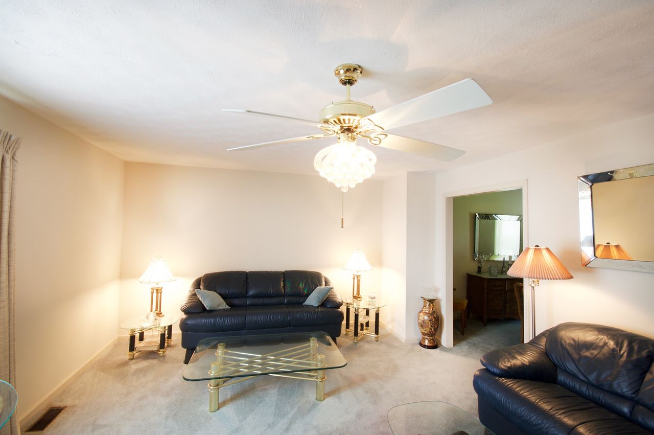 400 Cedar Green Road Staunton, VA 24401 - Photo 29 of 49 a living room with furniture and a chandelier