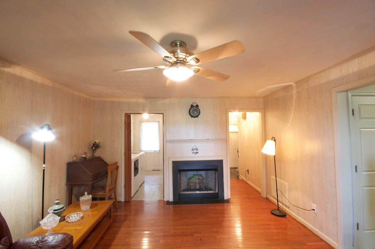 400 Cedar Green Road Staunton, VA 24401 - Photo 37 of 49 a living room with furniture and a fireplace
