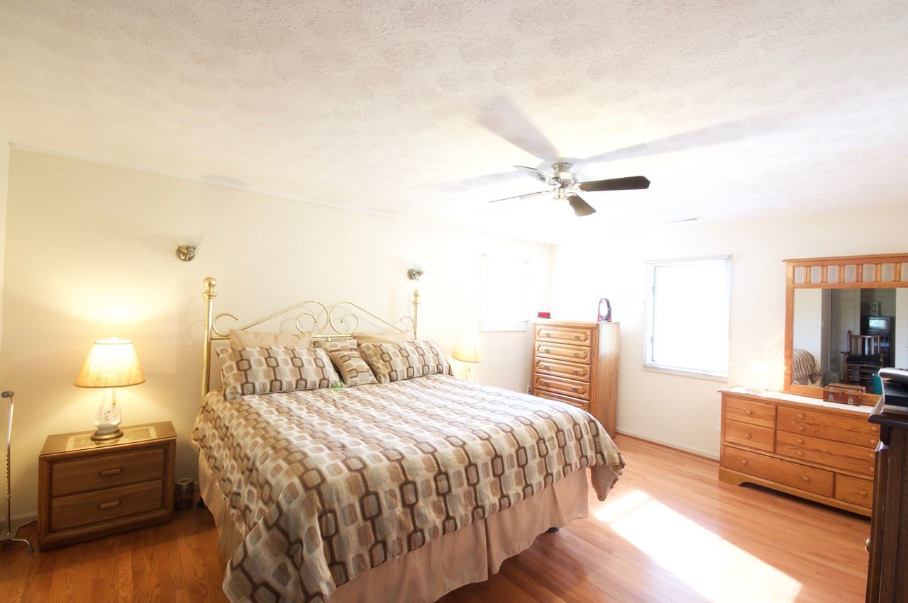 400 Cedar Green Road Staunton, VA 24401 - Photo 40 of 49 a bedroom with a bed and a night stand