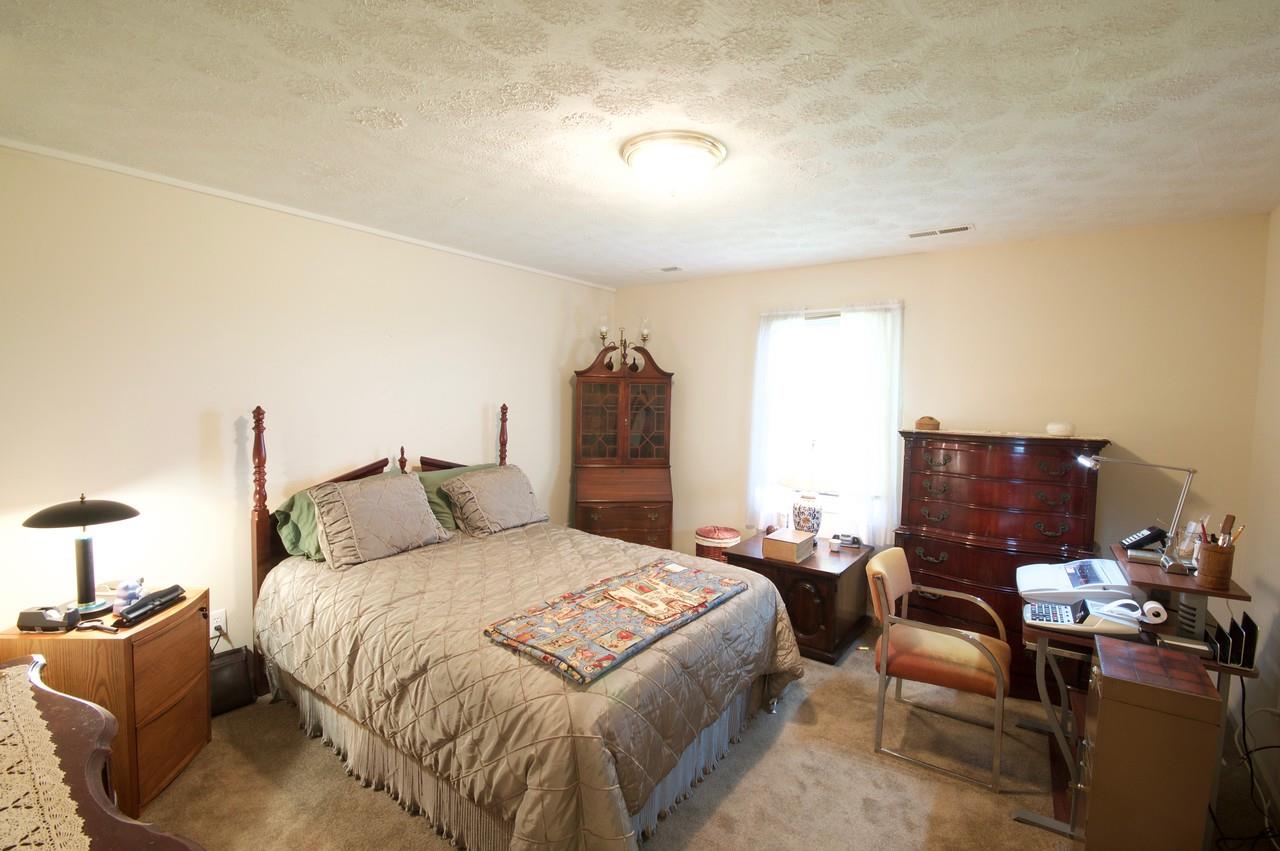 400 Cedar Green Road Staunton, VA 24401 - Photo 47 of 49 a bedroom with a bed and wooden floor
