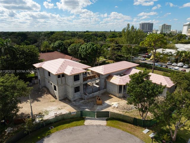 a aerial view of a house with a garden