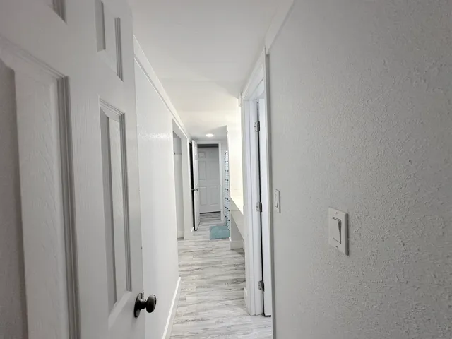 a view of a wooden floor in a room
