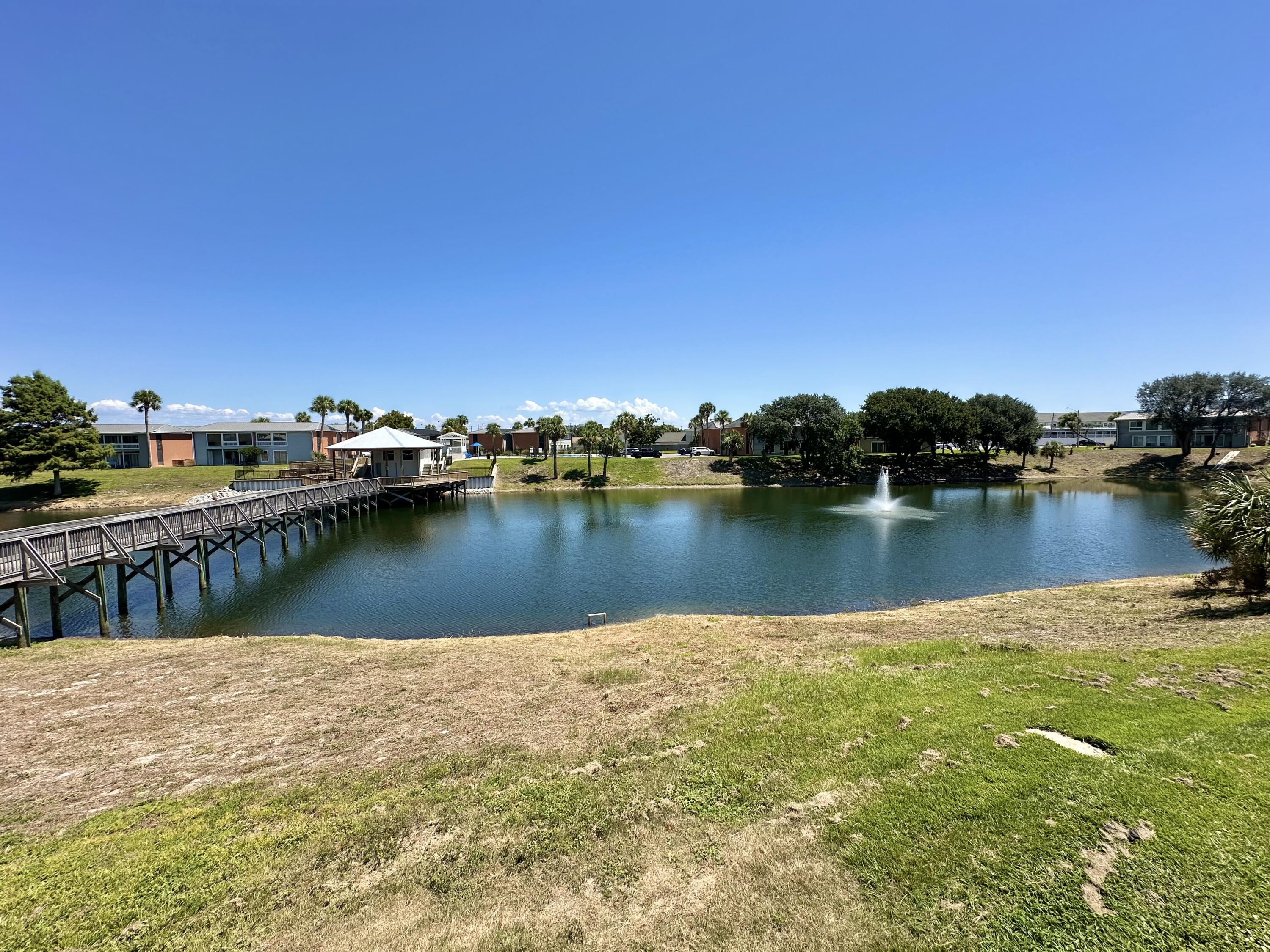 4000 Gulf Terrace Drive, Unit 1000 Destin, FL 32541 - Photo 32 of 37 a view of a lake with houses