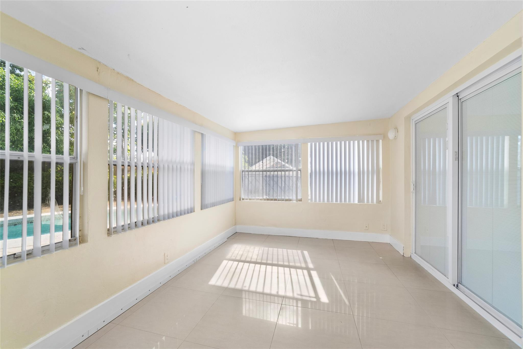 520 Southwest 72nd Terrace North Lauderdale, FL 33068 - Photo 12 of 35 a view of an empty room with a window