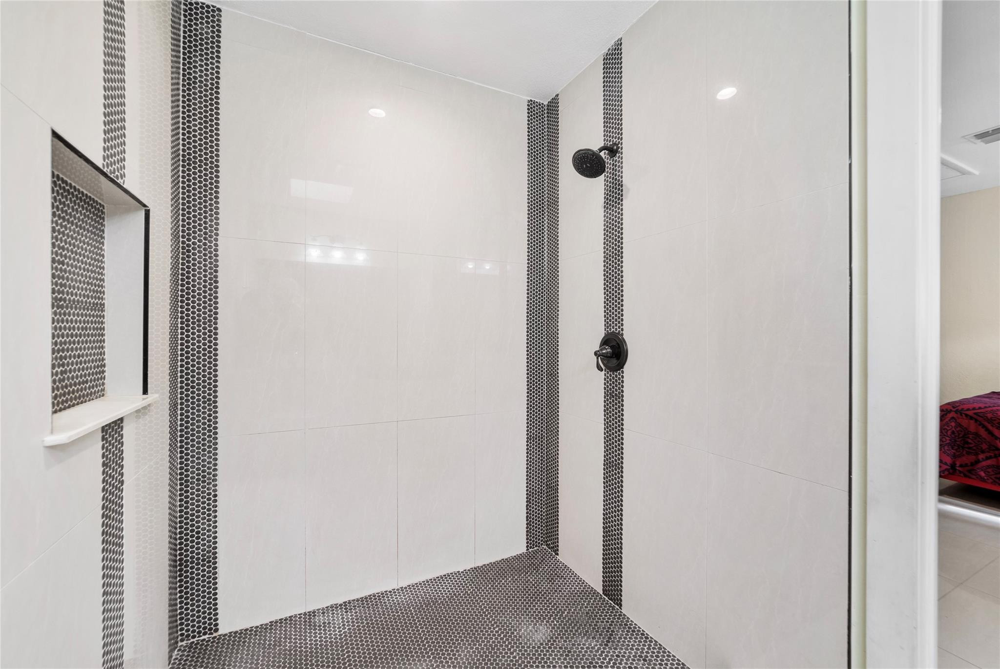 520 Southwest 72nd Terrace North Lauderdale, FL 33068 - Photo 20 of 35 a bathroom with a shower and a glass door