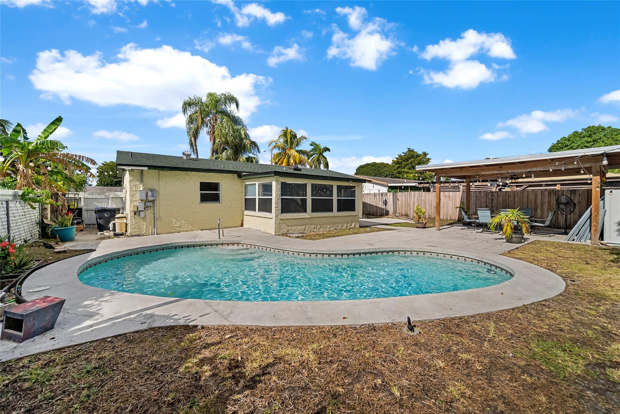 520 Southwest 72nd Terrace North Lauderdale, FL 33068 - Photo 25 of 35 a front view of a house with garden