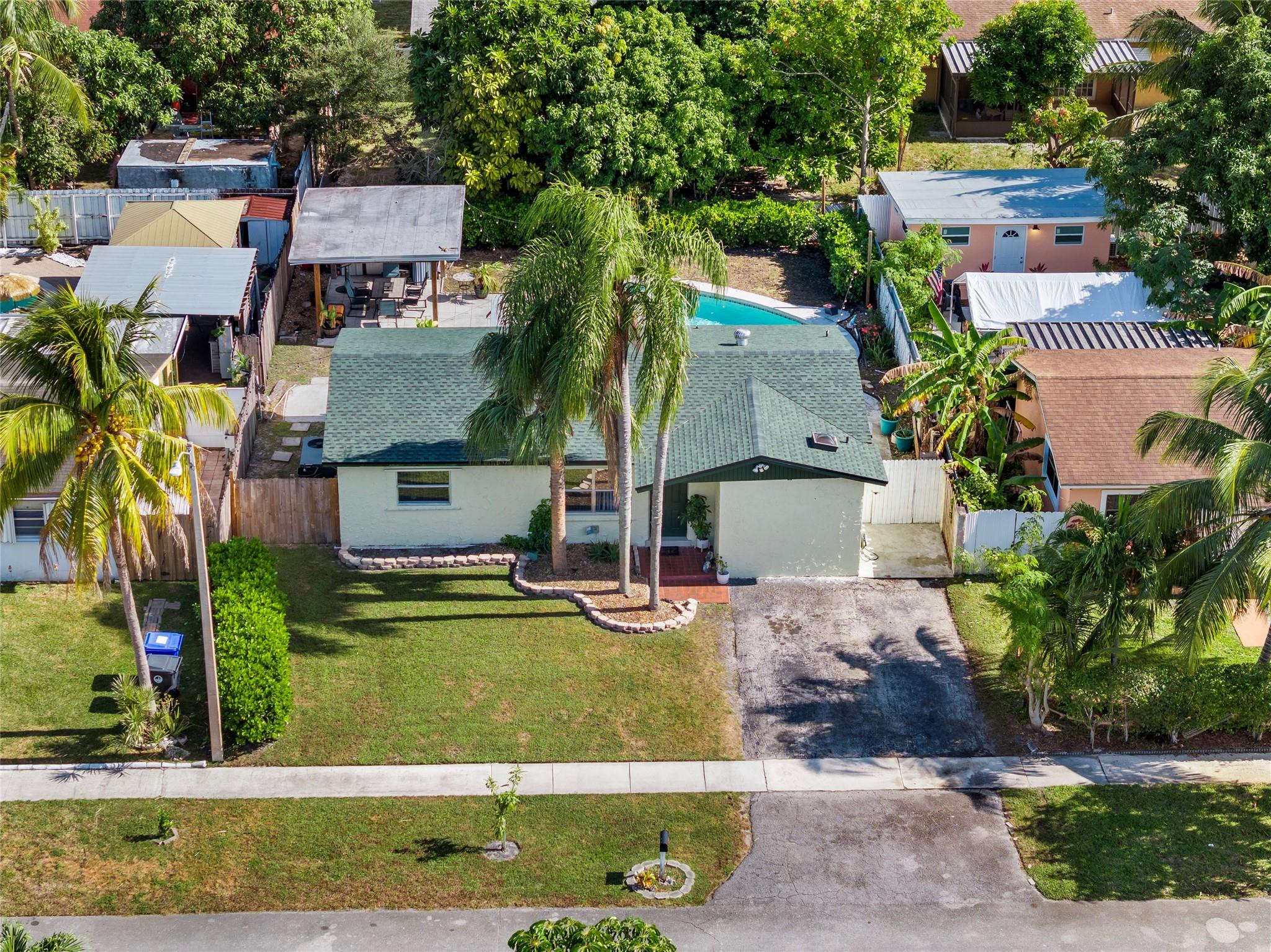 520 Southwest 72nd Terrace North Lauderdale, FL 33068 - Photo 28 of 35 an aerial view of a house with a yard basket ball court and outdoor seating