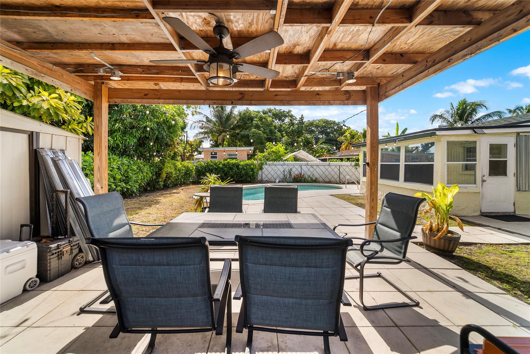 520 Southwest 72nd Terrace North Lauderdale, FL 33068 - Photo 33 of 35 a view of a patio with a table chairs and a grill