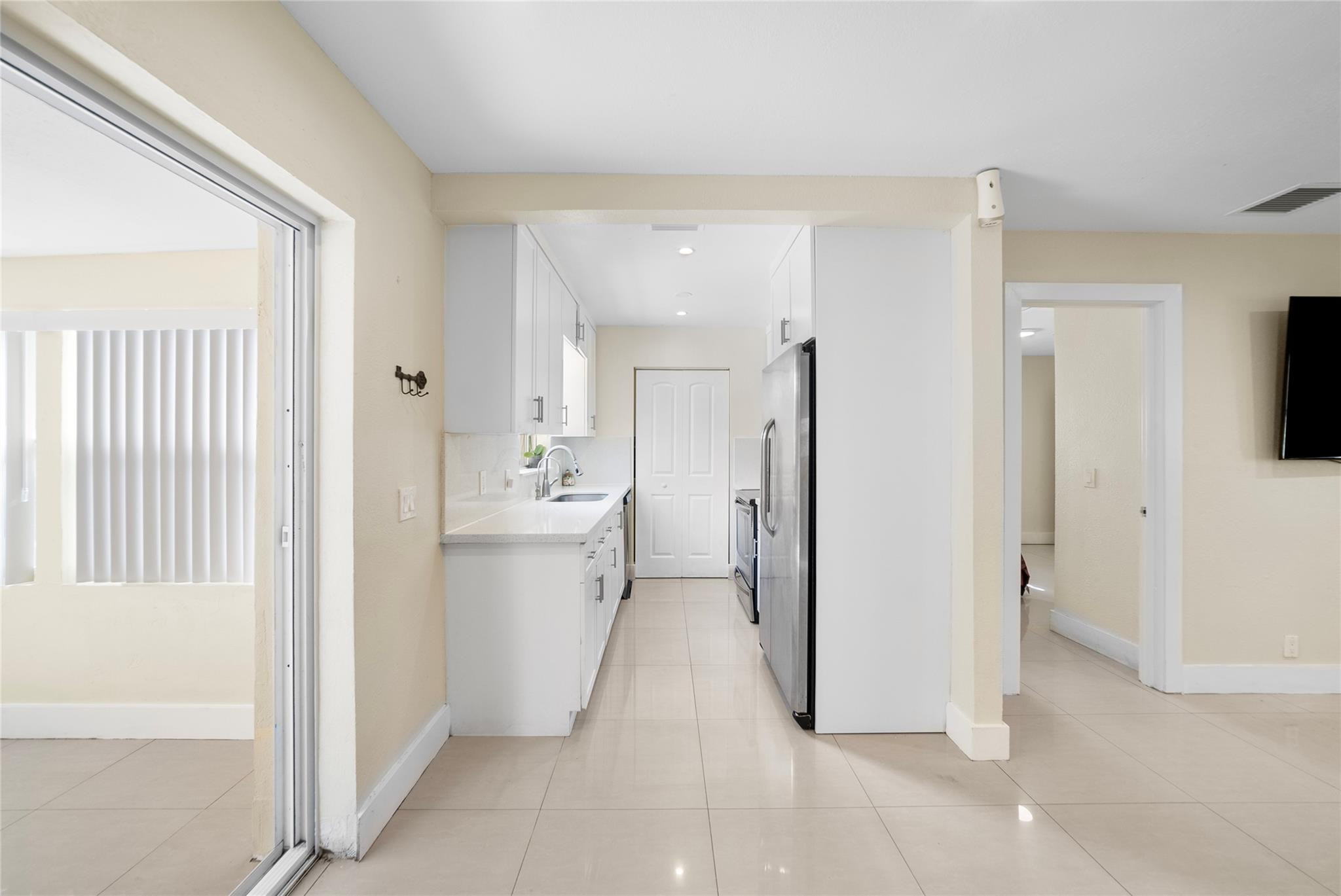 520 Southwest 72nd Terrace North Lauderdale, FL 33068 - Photo 6 of 35 a bathroom with a sink and a mirror