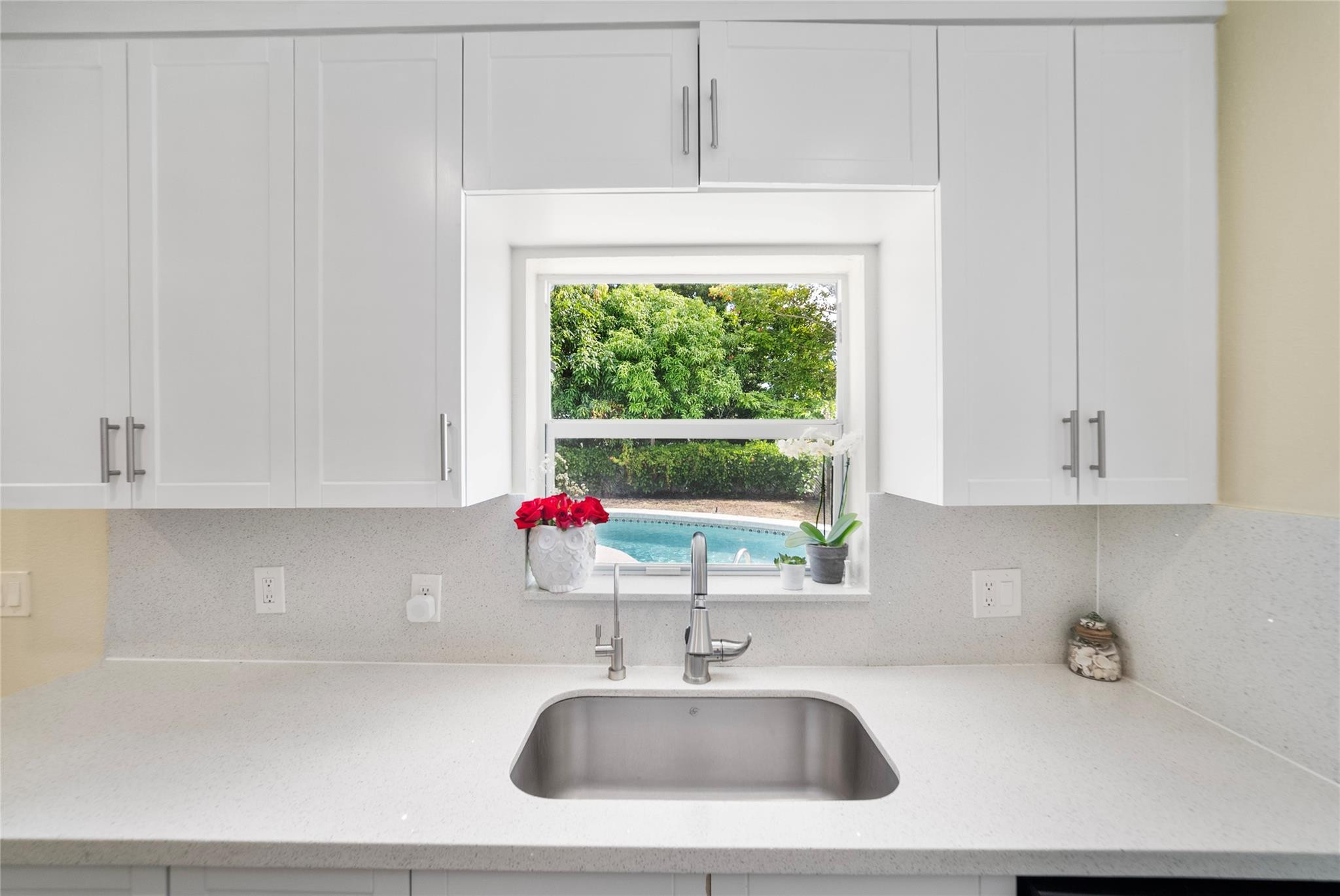 520 Southwest 72nd Terrace North Lauderdale, FL 33068 - Photo 10 of 35 a bathroom with a sink and a window