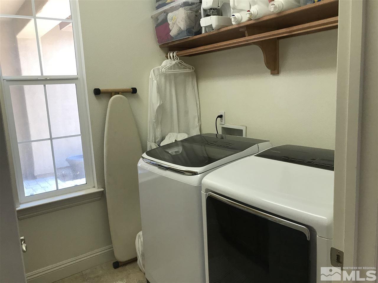 615 Equine Court Reno, NV 89521 - Photo 18 of 25 a utility room with dryer and washer