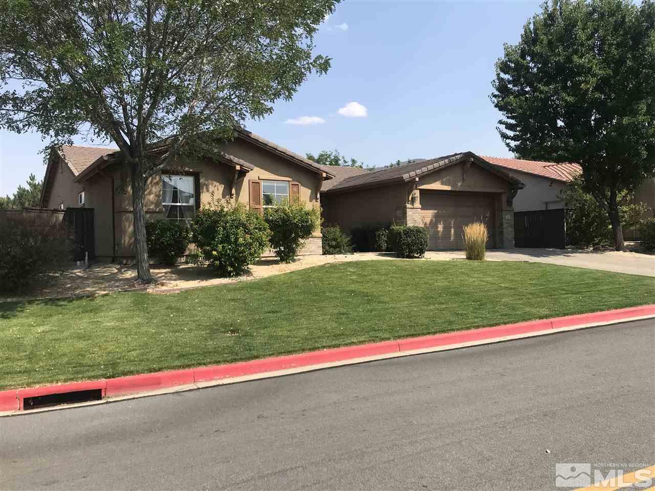 615 Equine Court Reno, NV 89521 - Photo 24 of 25 a front view of house with yard and green space