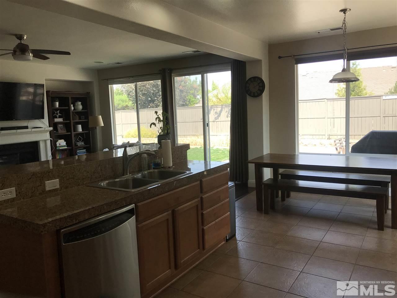 615 Equine Court Reno, NV 89521 - Photo 6 of 25 a kitchen with a sink and large window