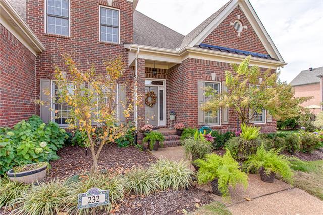 232 Chester Stevens Road Franklin, TN 37067 - Photo 2 of 20 EXTENSIVE IRRIGATED GARDEN BEDDING GREETS YOU BOTH IN THE FRONT & REAR YARDS OF THIS HOME AND IT BACKS TO TREES....